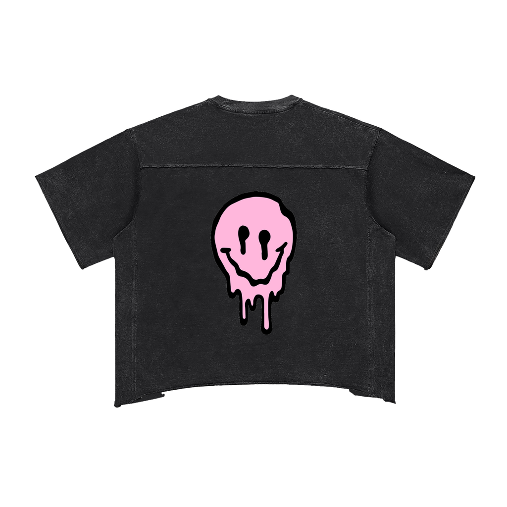 Black t-shirt with a pink smiley face design on a white background